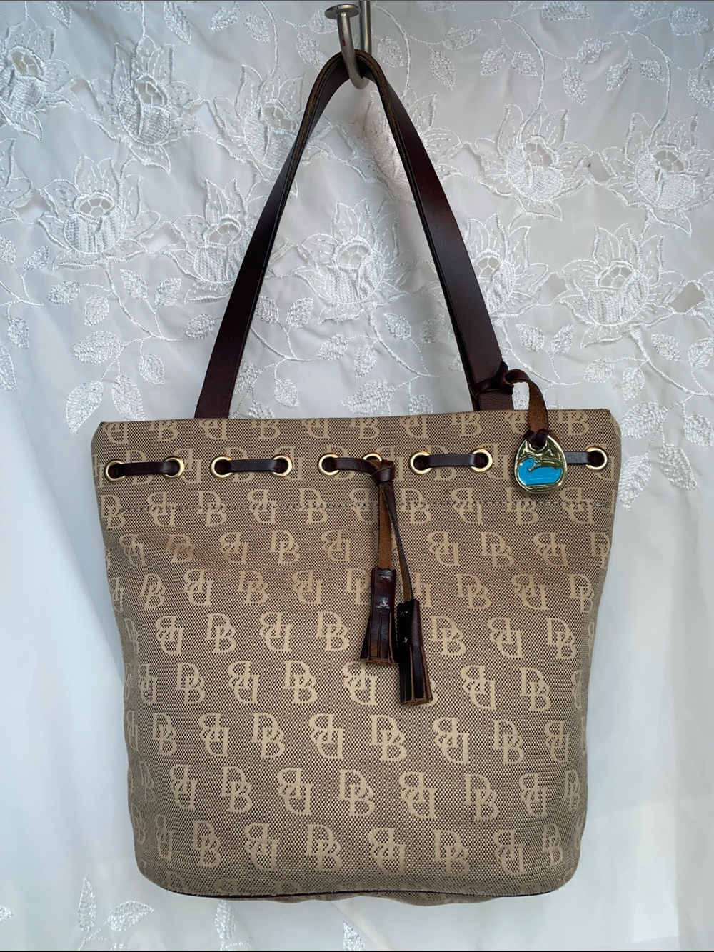 Dooney & Bourke Signature Tan Brown Logo Canvas Bucket Tote with Tassel Charm